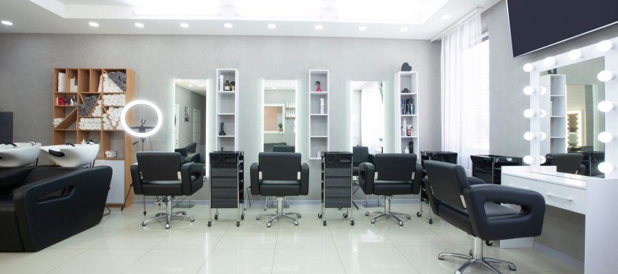Hairdressing procedures in luxe beauty salon, panorama, free space